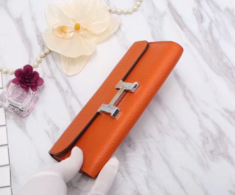 H**me5 Constance Togo Long Wallet 20cm/7.9in Silver Toned Hardware For Women Orange